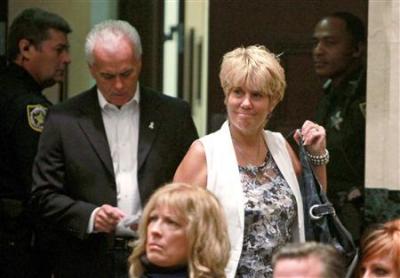George and Cindy Anthony enter the courtroom for daughter Casey's sentencing at the Orange County Courthouse in Orlando