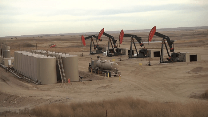 large-well-site-tank-battery-and-tank-truck_ny074d_y__F0000